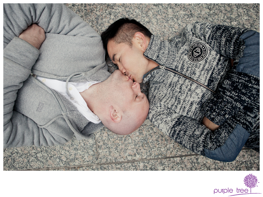two gay men kissing